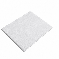 White bath mat on a white background