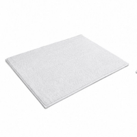 White bath mat on a white background