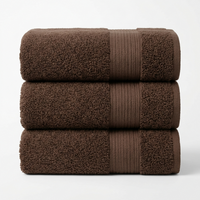 Stack of 3 folded brown towels, straight-on, white background